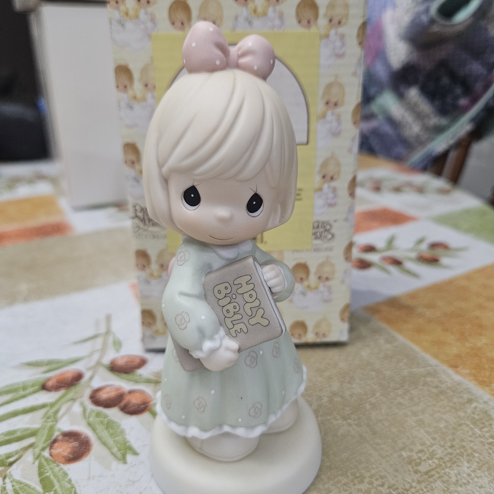 Precious Moments Porcelain Figurine with Yellow Accents